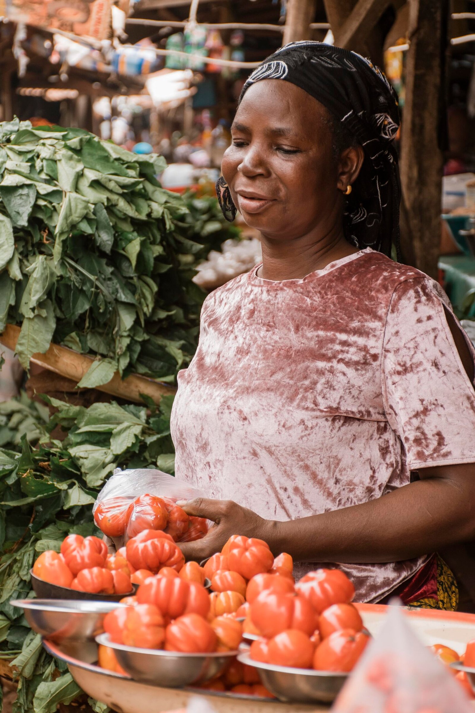 medium shot woman holding vegetables